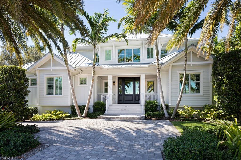 1040 2nd Street South Naples, FL 34102 - Photo 42 of 42 a front view of a house with a yard