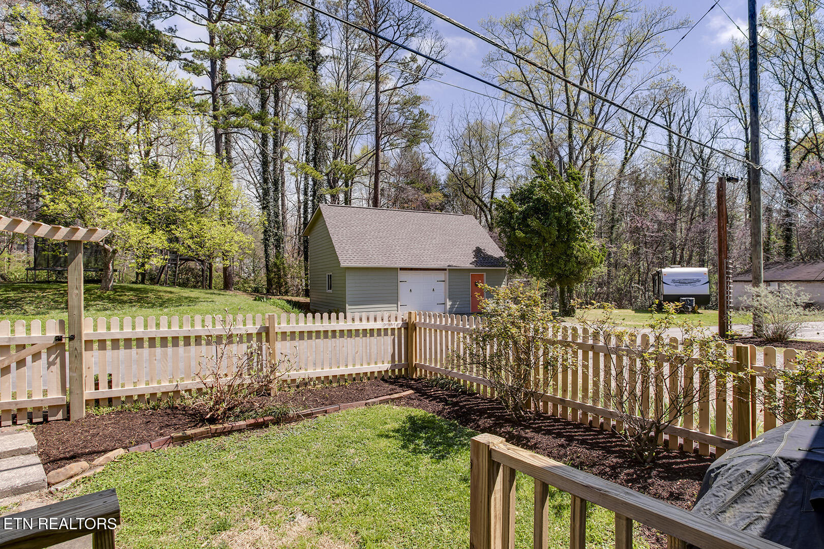 123 Orchard Road Norris, TN 37828 - Photo 47 of 52 46_OrchardRoad_123_DeckView-Garage