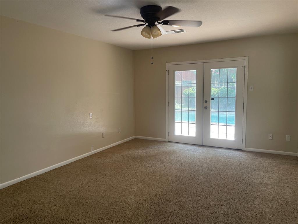 13308 Purple Sage Road Dallas, TX 75240 - Photo 14 of 18 a view of an empty room with a window