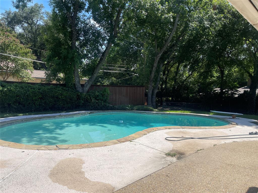 13308 Purple Sage Road Dallas, TX 75240 - Photo 5 of 18 a view of backyard with green space