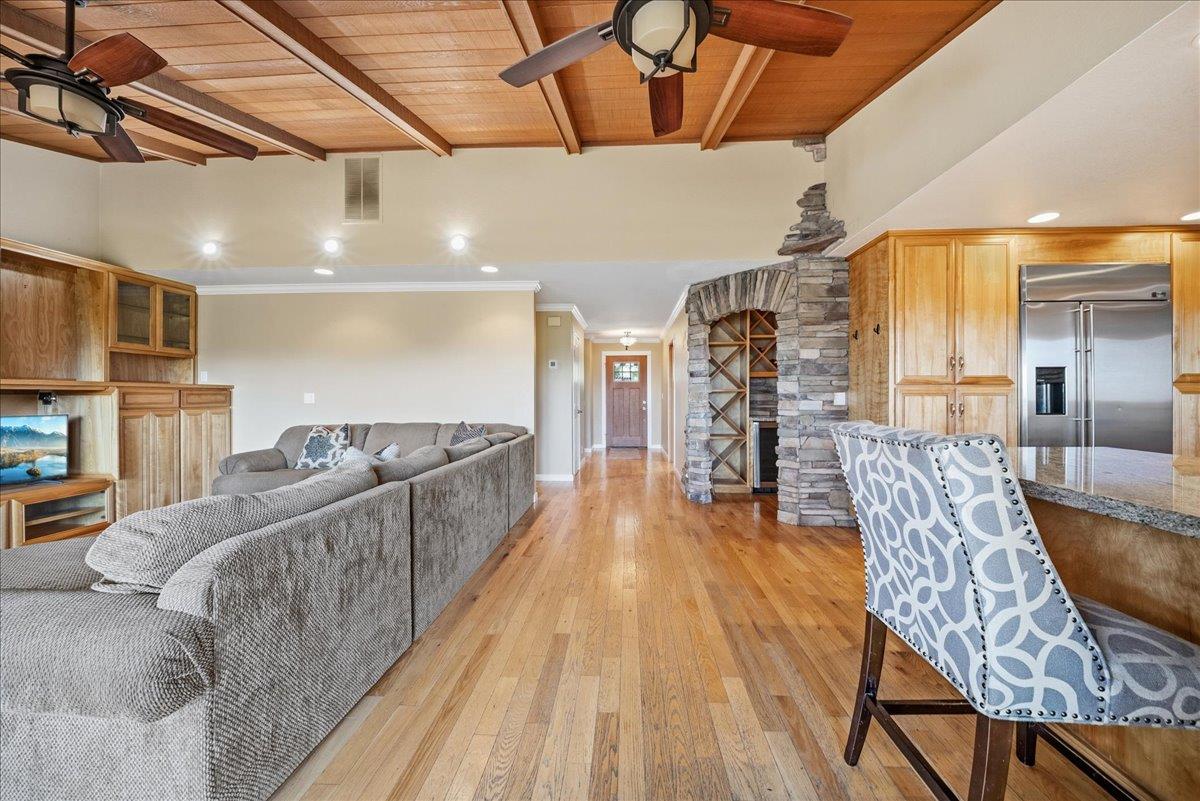 16035 Running Springs Road Grass Valley, CA 95949 - Photo 13 of 94 a living room with furniture and a wooden floor