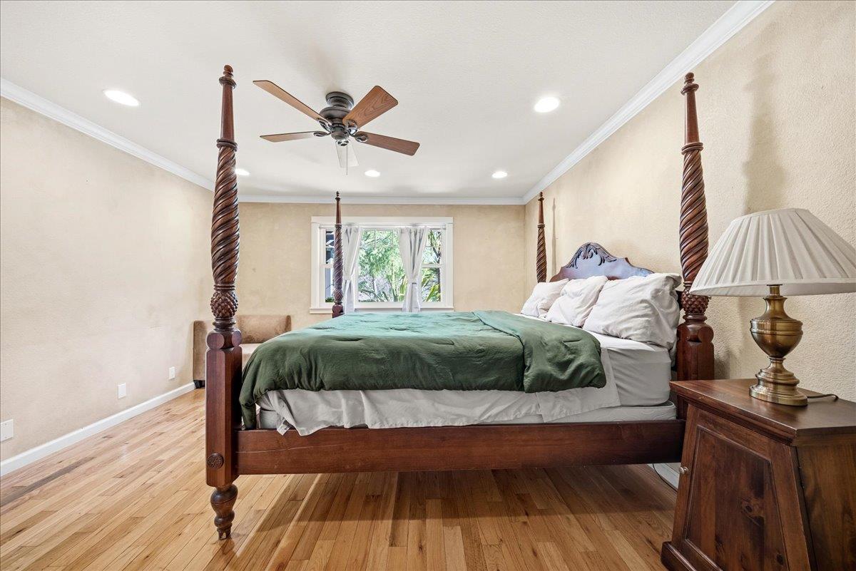 16035 Running Springs Road Grass Valley, CA 95949 - Photo 17 of 94 a bedroom with a bed and wooden floor