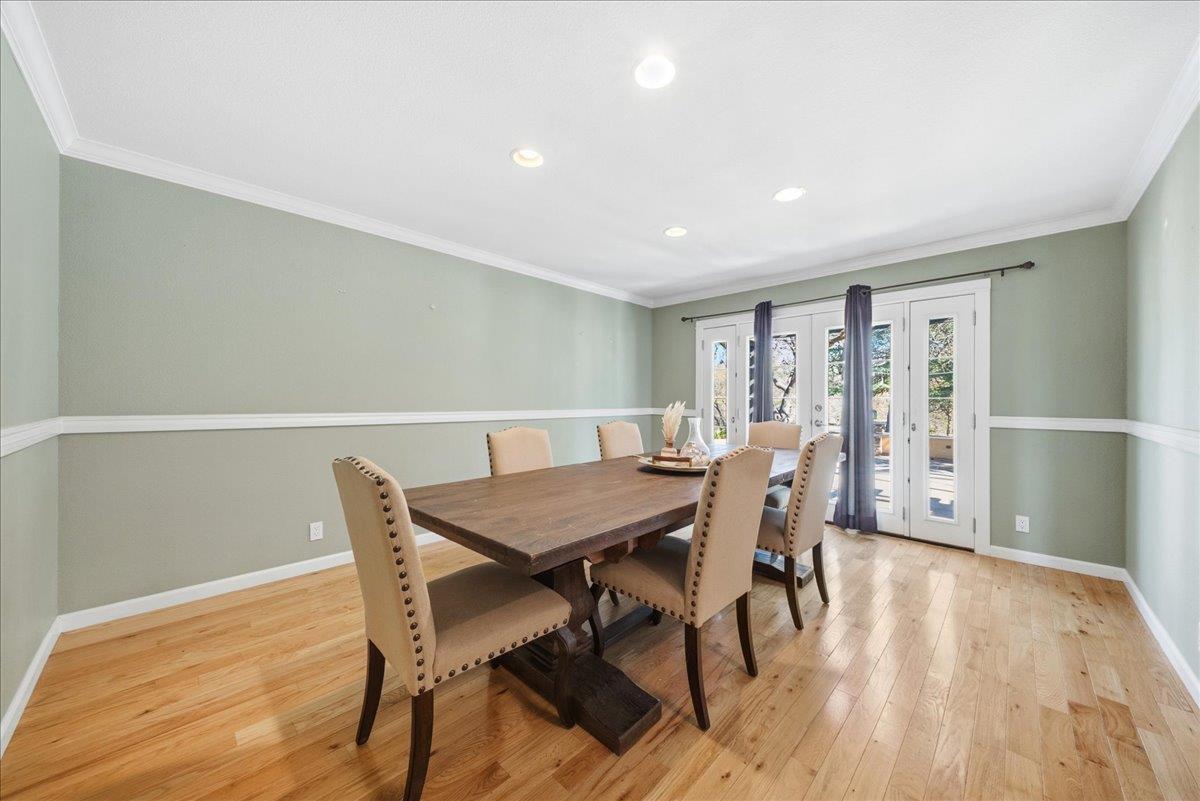 16035 Running Springs Road Grass Valley, CA 95949 - Photo 18 of 94 a view of a dining room with furniture and wooden floor