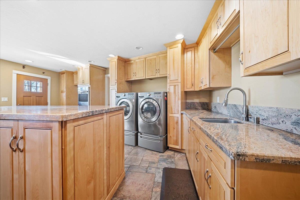 16035 Running Springs Road Grass Valley, CA 95949 - Photo 31 of 94 a kitchen with stainless steel appliances granite countertop a sink and cabinets