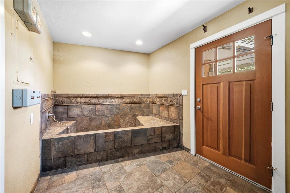 16035 Running Springs Road Grass Valley, CA 95949 - Photo 33 of 94 a view of a bathroom with a tub and shower