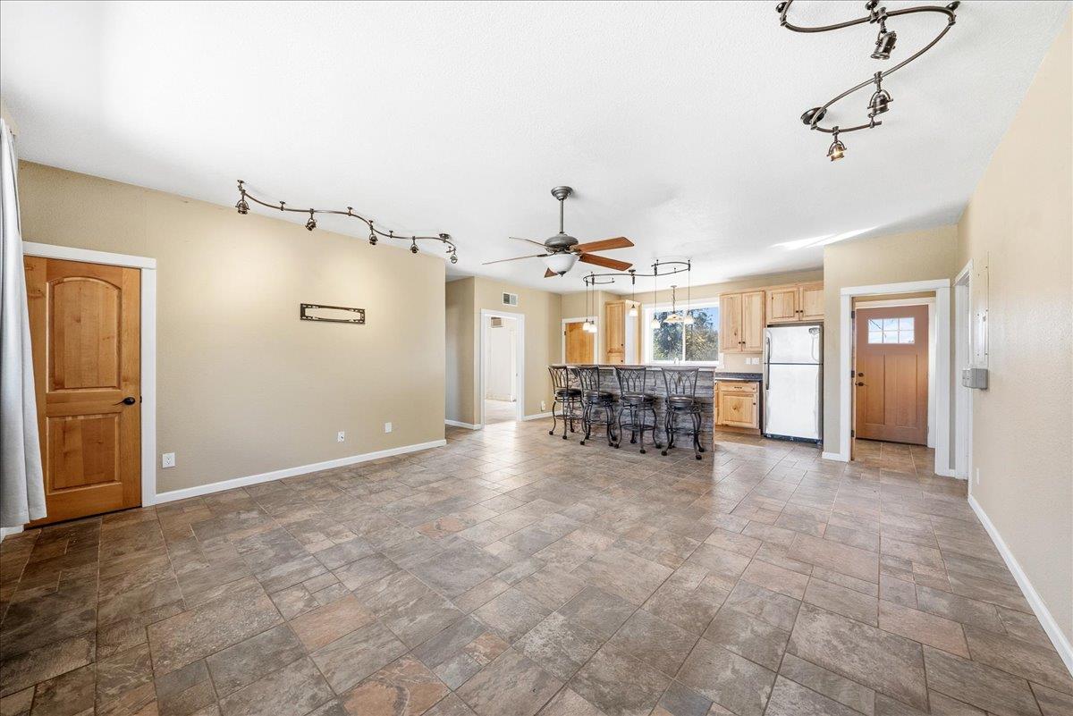 16035 Running Springs Road Grass Valley, CA 95949 - Photo 38 of 94 a view of a livingroom with furniture and a chandelier