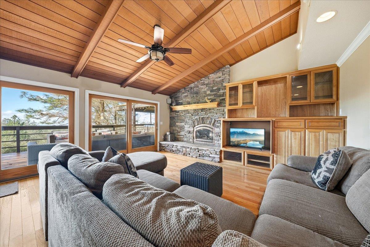 16035 Running Springs Road Grass Valley, CA 95949 - Photo 6 of 94 a living room with furniture ceiling fan and a large window