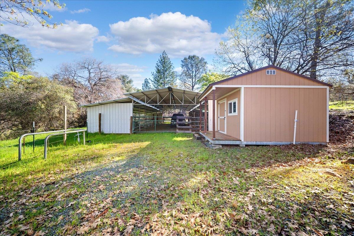 16035 Running Springs Road Grass Valley, CA 95949 - Photo 63 of 94 a backyard of a house with lots of green space