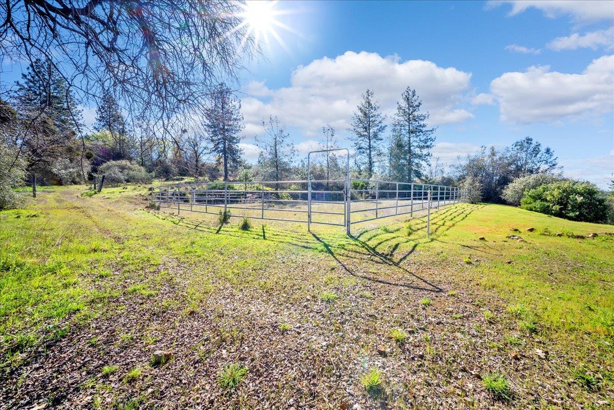16035 Running Springs Road Grass Valley, CA 95949 - Photo 69 of 94 a view of a swimming pool with a yard