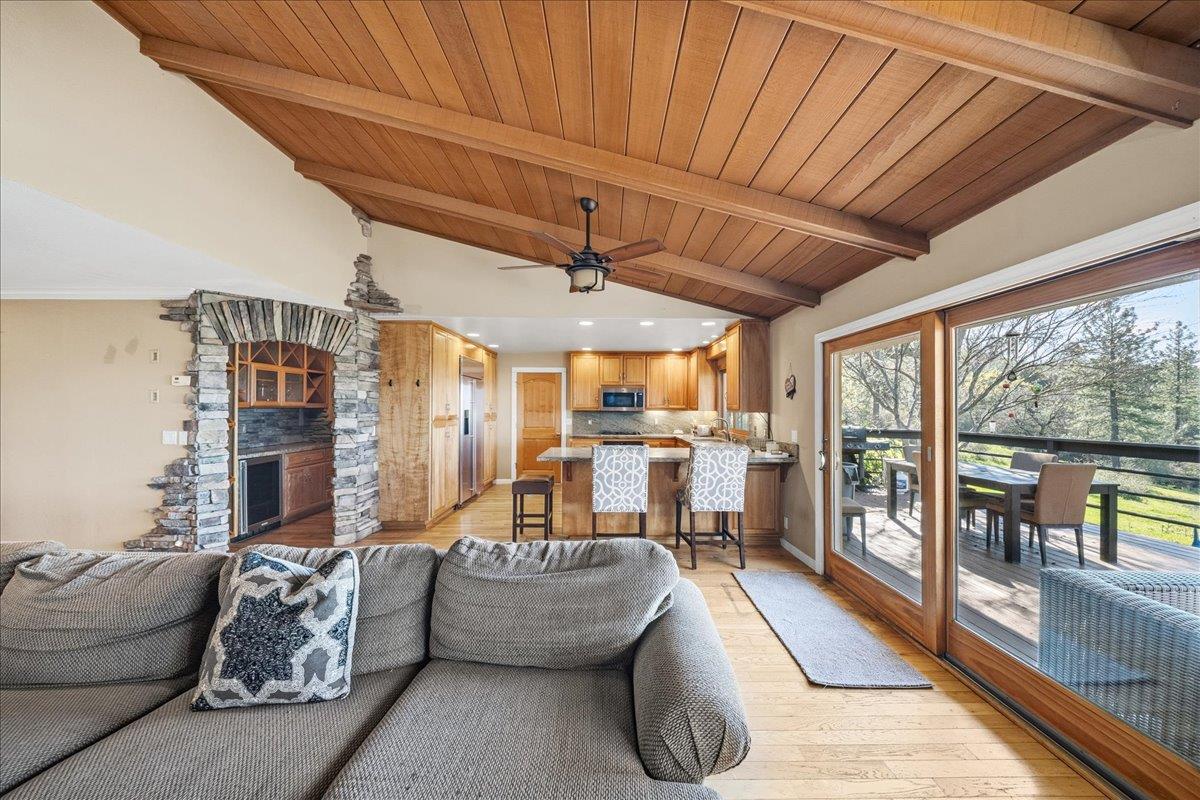 16035 Running Springs Road Grass Valley, CA 95949 - Photo 8 of 94 a living room with furniture and a chandelier