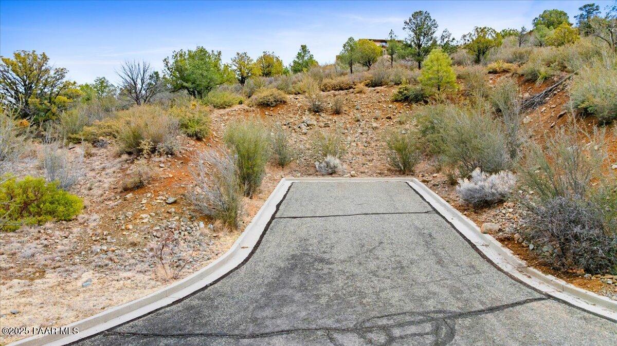 872 Spring Trail Prescott, AZ 86303 - Photo 11 of 11 a view of a yard with a pathway