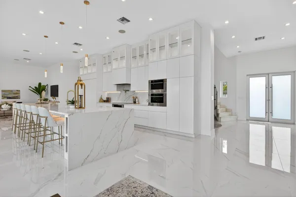 a view of a dining room with furniture window and outside view