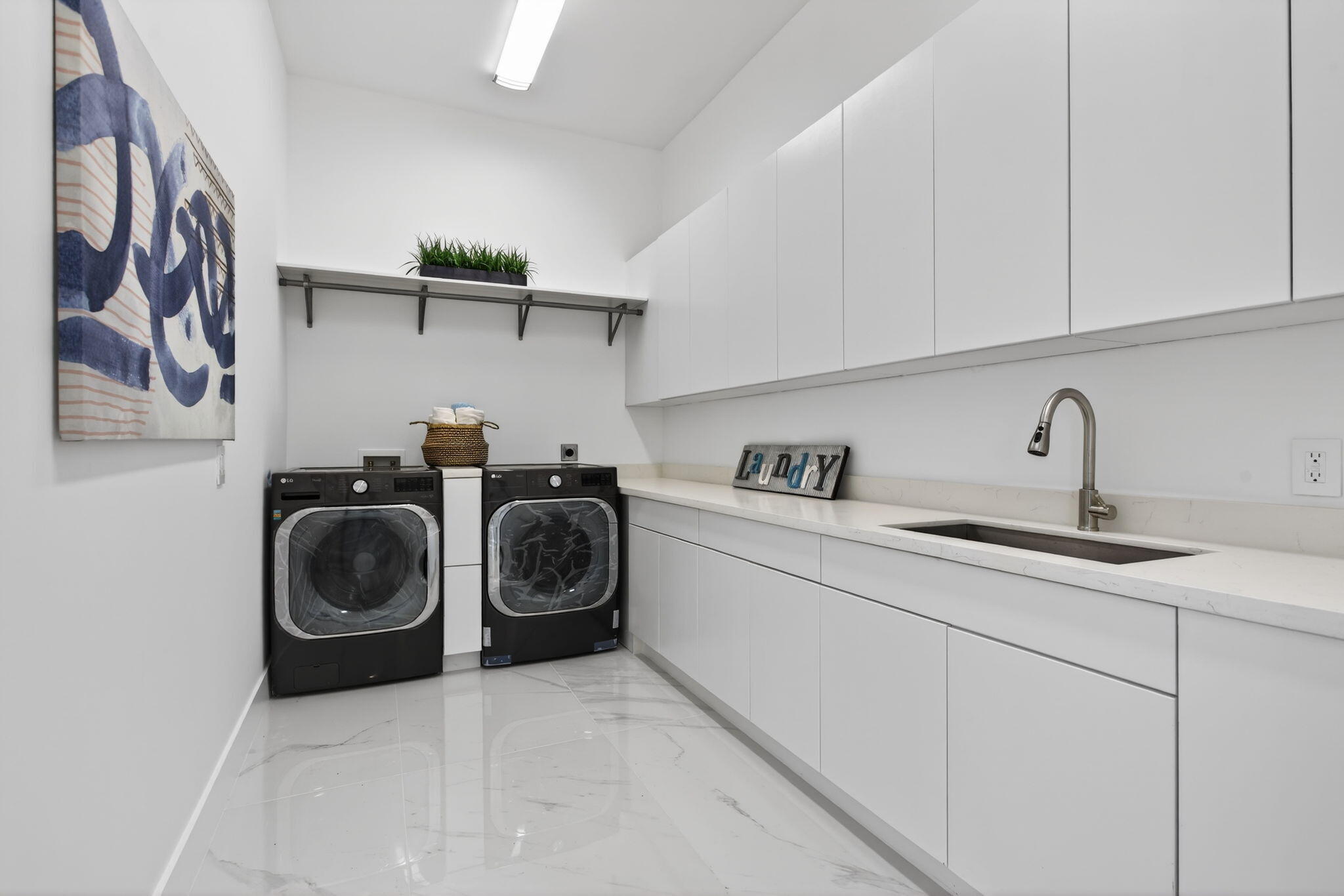 2641 Northeast 48th Street Lighthouse Point, FL 33064 - Photo 55 of 88 upstairs laundry room