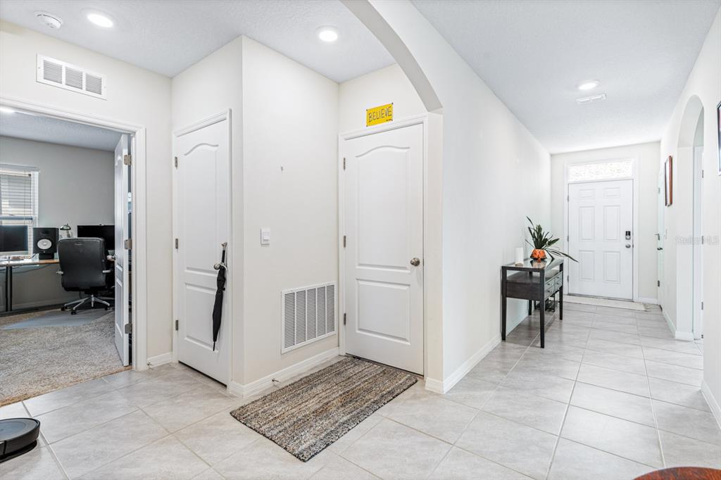 5381 Hickory Downs Way St. Cloud, FL 34771 - Photo 29 of 35 a view of a hallway view with couch and a living room