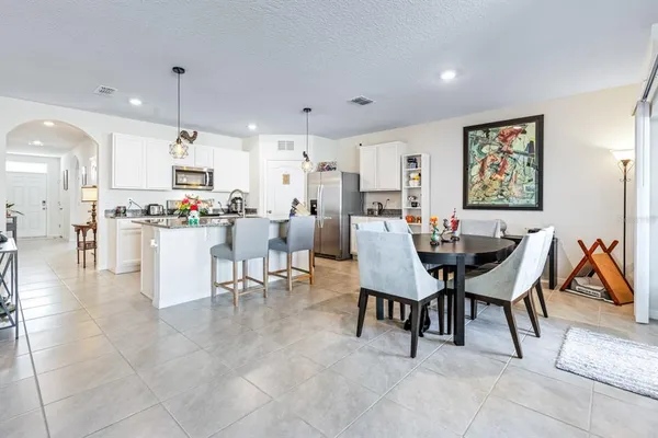 a view of a dining room with furniture