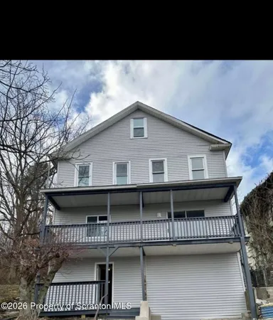 a view of a house with a balcony