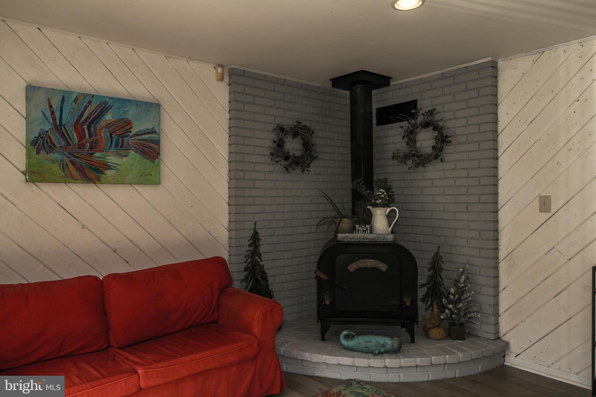 8147 Elizabeth Road Pasadena, MD 21122 - Photo 4 of 23 Wood Stove