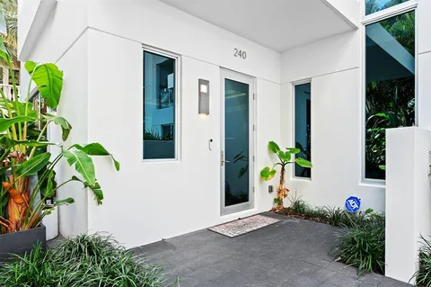 a view of a chairs and table in patio