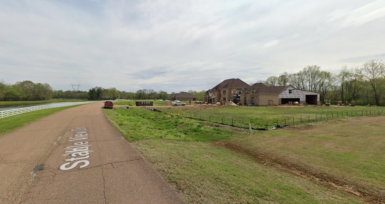 11760 Stable View Drive Eads, TN 38028 - Photo 5 of 8 a view of a road with a garden