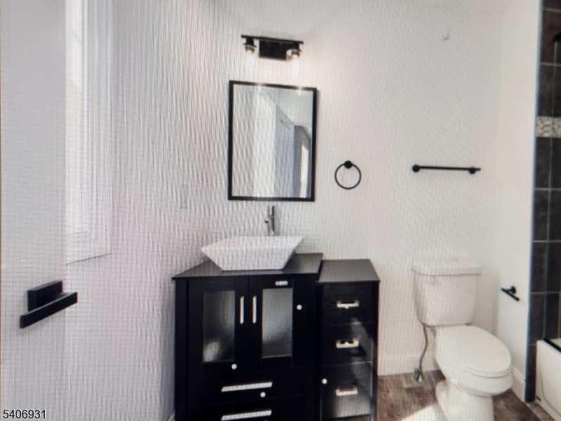 30 8th Street Frenchtown, NJ 08825 - Photo 14 of 17 a bathroom with a toilet a sink and mirror