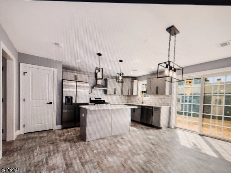 30 8th Street Frenchtown, NJ 08825 - Photo 6 of 17 a large kitchen with kitchen island a sink stainless steel appliances and cabinets
