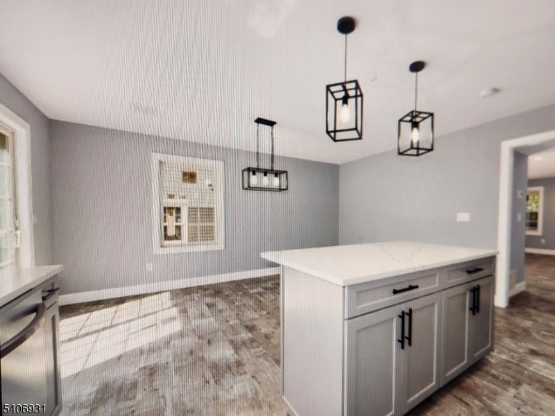 30 8th Street Frenchtown, NJ 08825 - Photo 8 of 17 a kitchen with kitchen island a counter space a sink and appliances