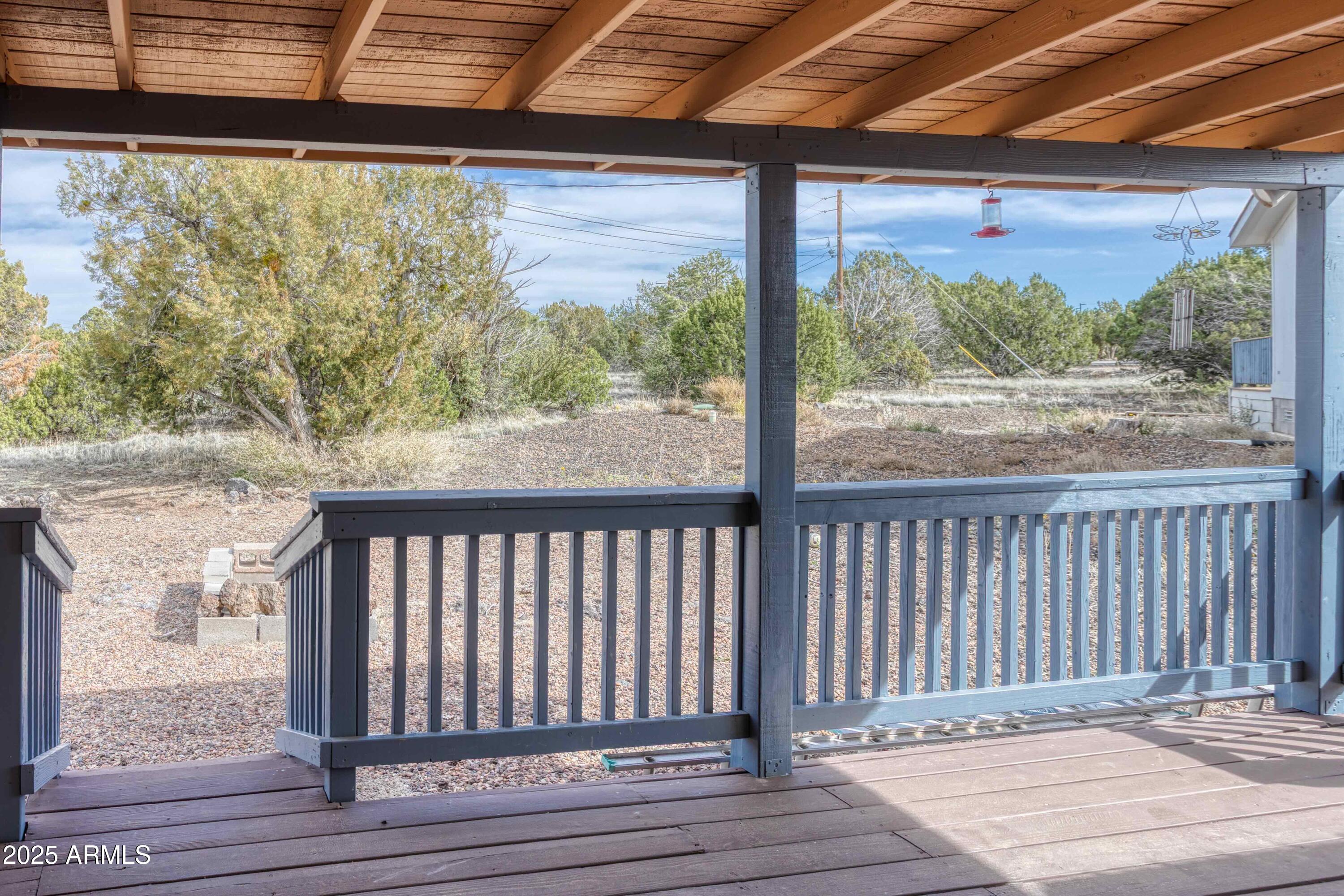 8286 Ridge Drive Show Low, AZ 85901 - Photo 2 of 21 a view of a wooden deck
