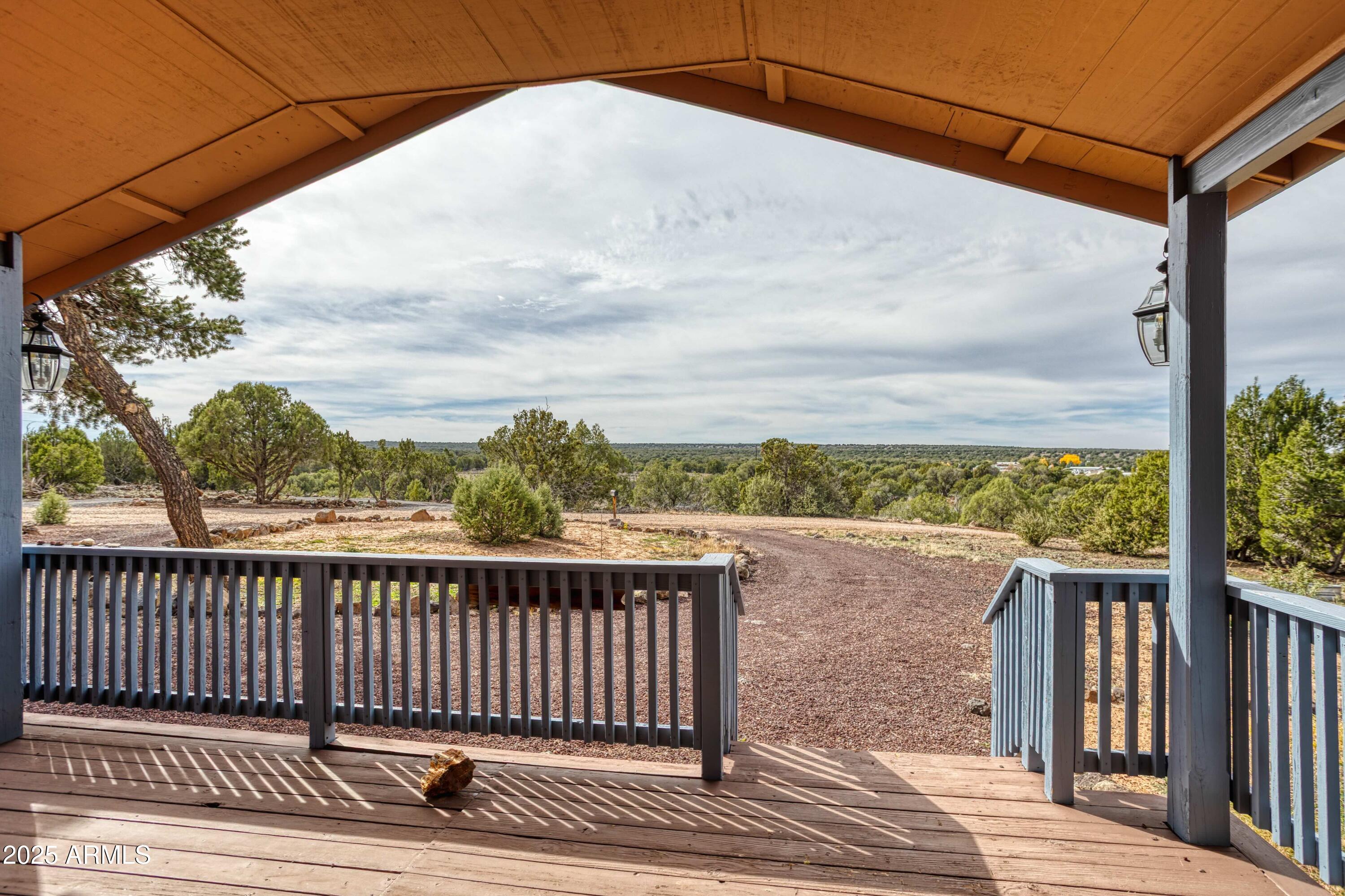 8286 Ridge Drive Show Low, AZ 85901 - Photo 4 of 21 a view of a city street from a balcony