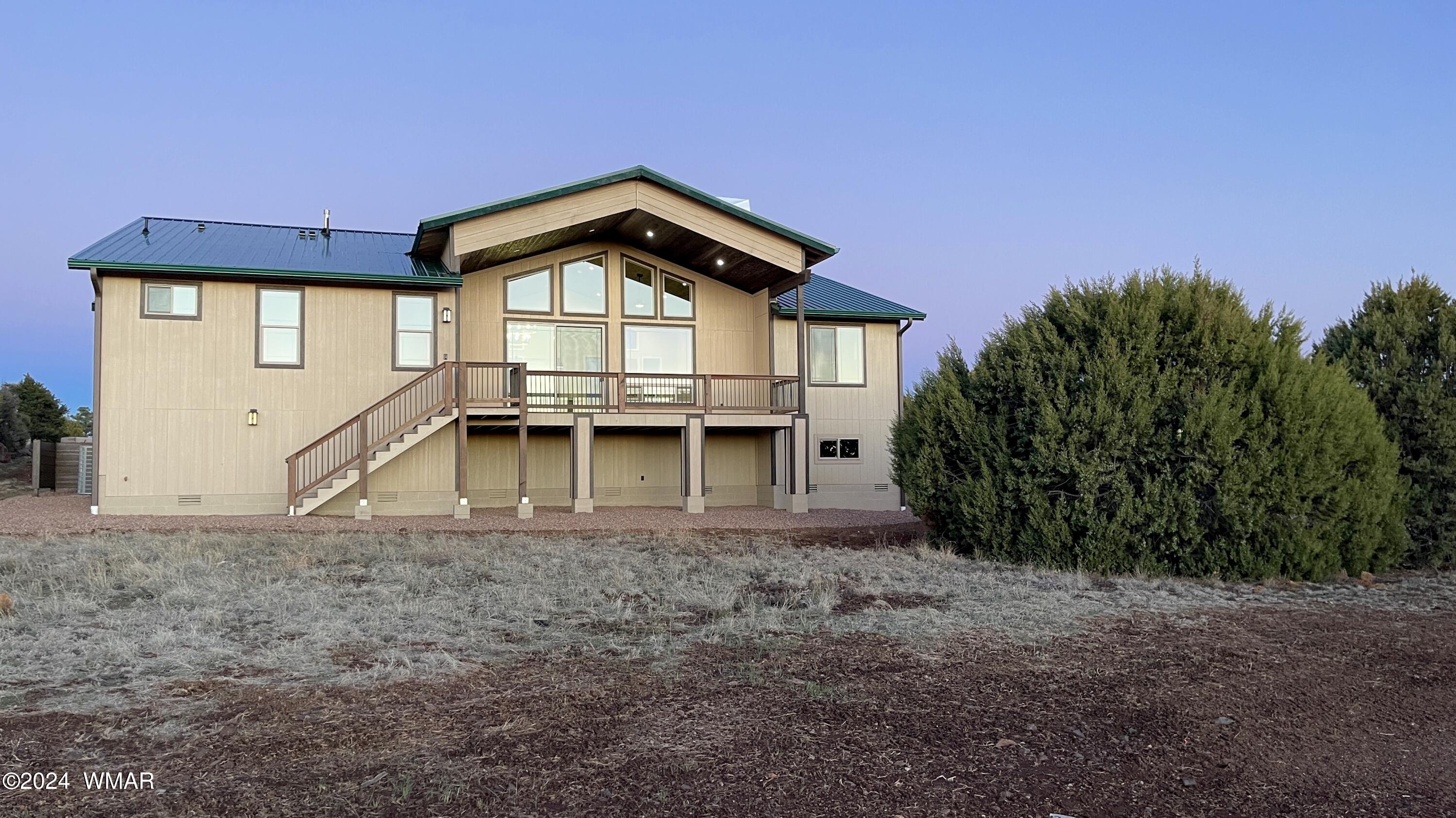 Rear view of home at dusk