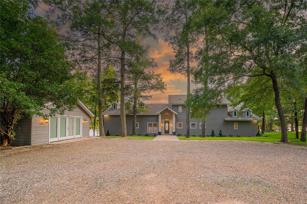 582 Windy Point Mount Vernon, TX 75457 - Photo 5 of 38 View of front of house with an outdoor structure and french doors