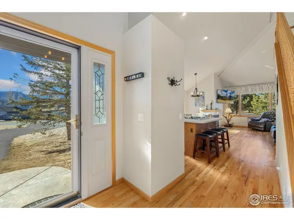 a view of a living room and a window