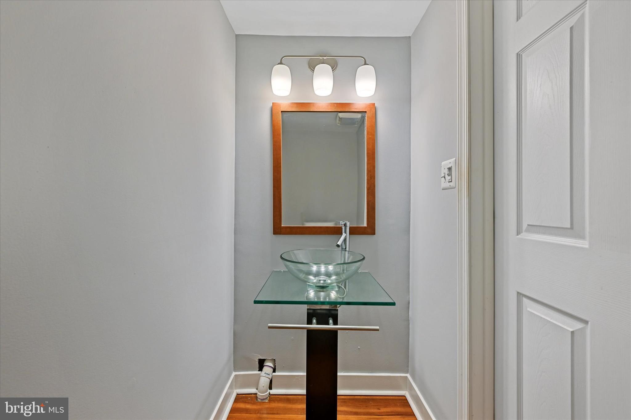 10533 Stevenson Road Stevenson, MD 21153 - Photo 33 of 45 a view of bathroom with mirror