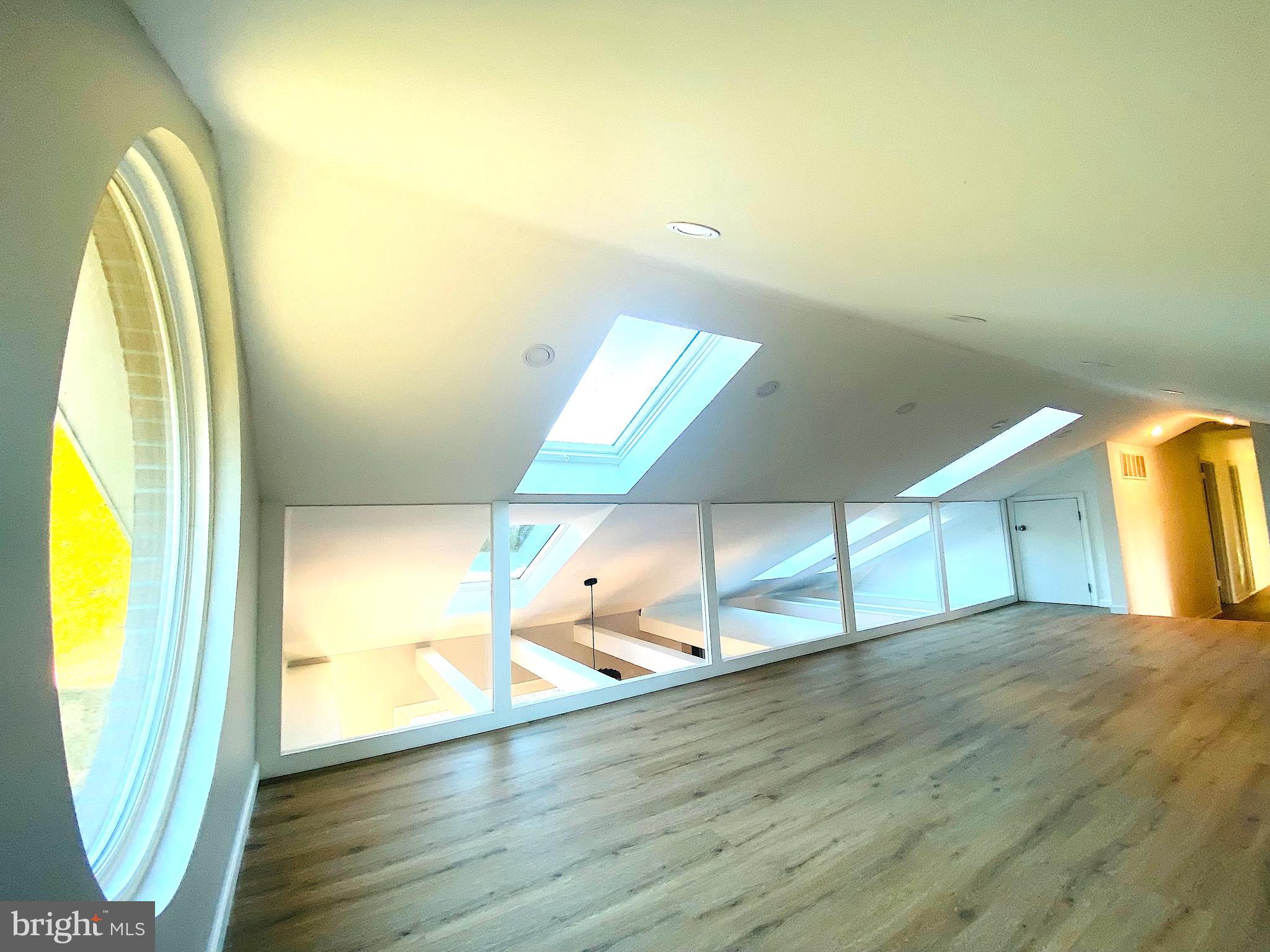 10533 Stevenson Road Stevenson, MD 21153 - Photo 38 of 45 a view of a room with wooden floor