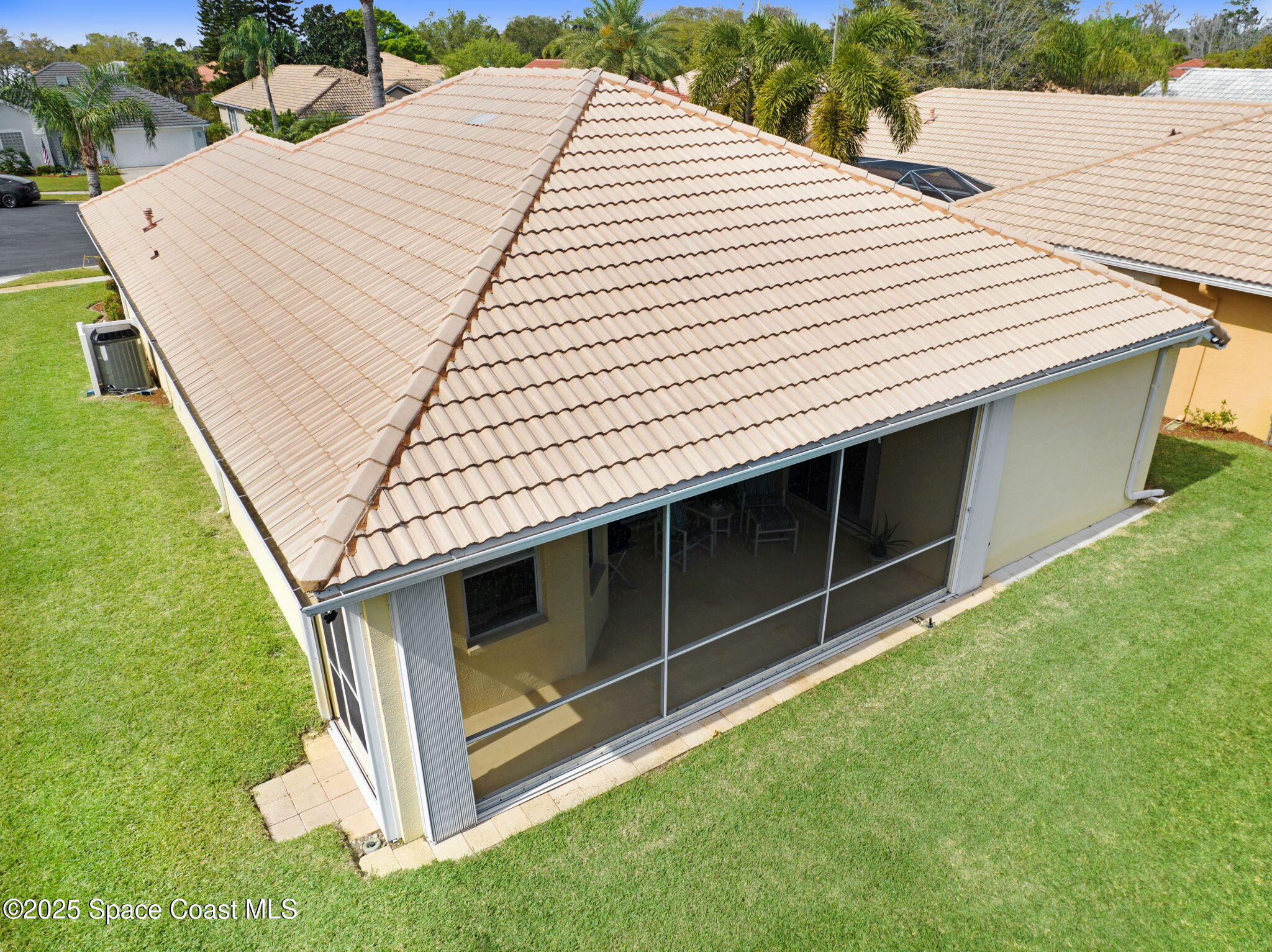 507 Royston Lane Melbourne, FL 32940 - Photo 13 of 52 a aerial view of a house with a yard