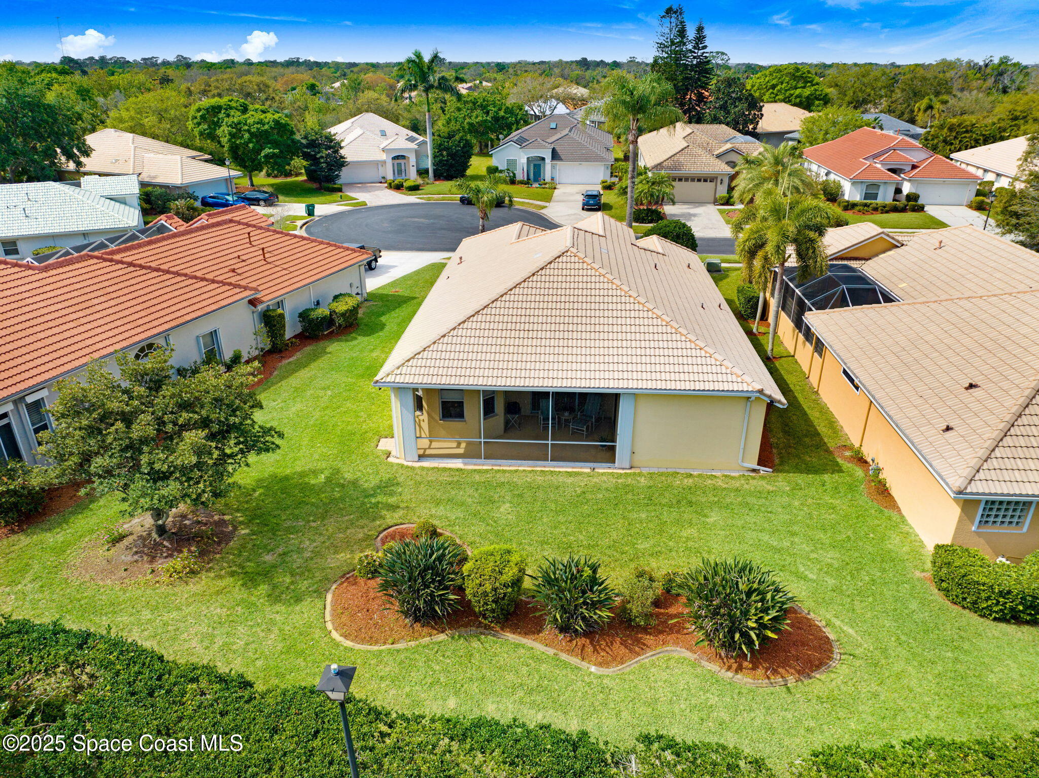 507 Royston Lane Melbourne, FL 32940 - Photo 14 of 52 an aerial view of a house with garden space and street view