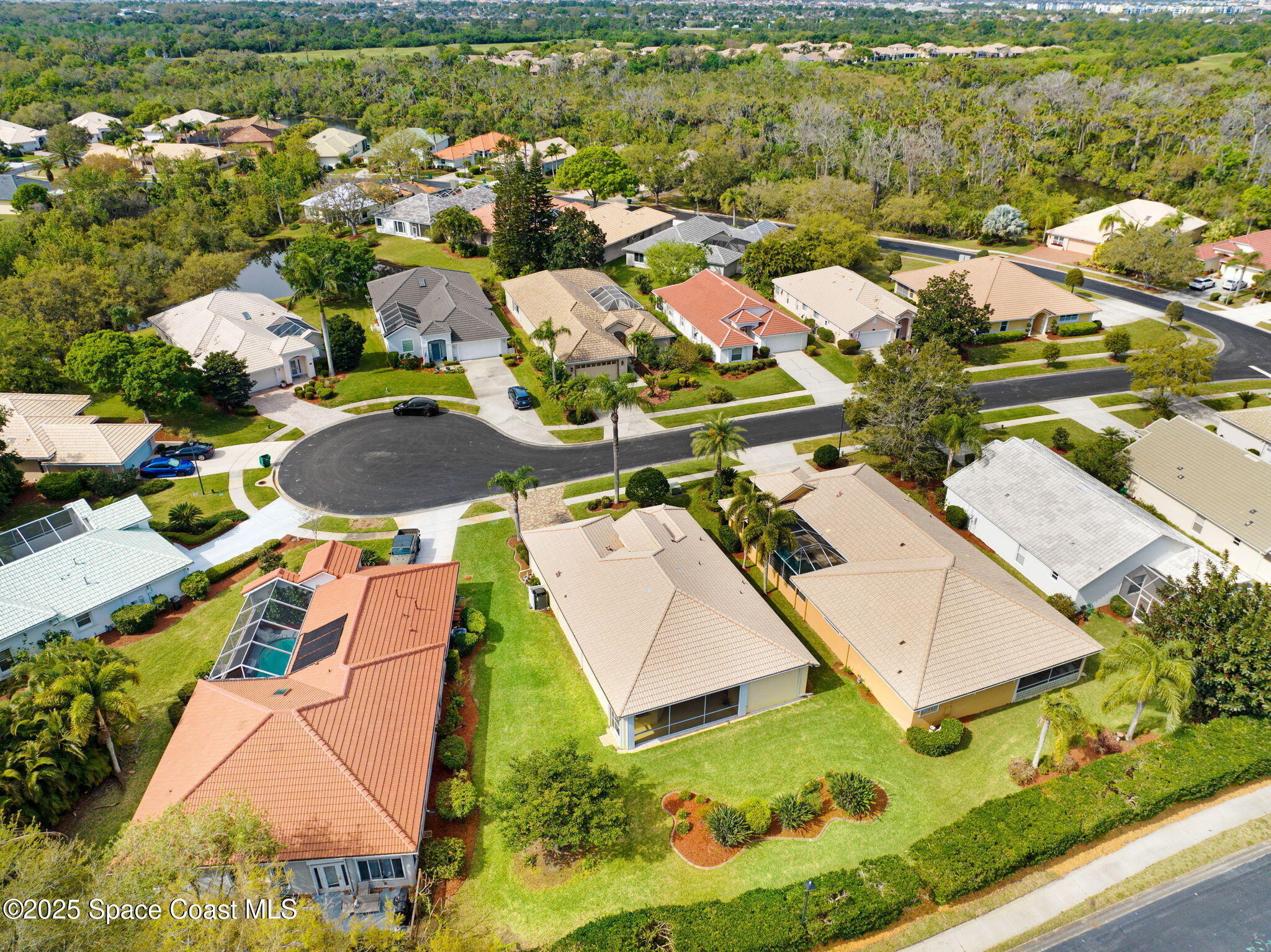 507 Royston Lane Melbourne, FL 32940 - Photo 15 of 52 an aerial view of residential houses with outdoor space