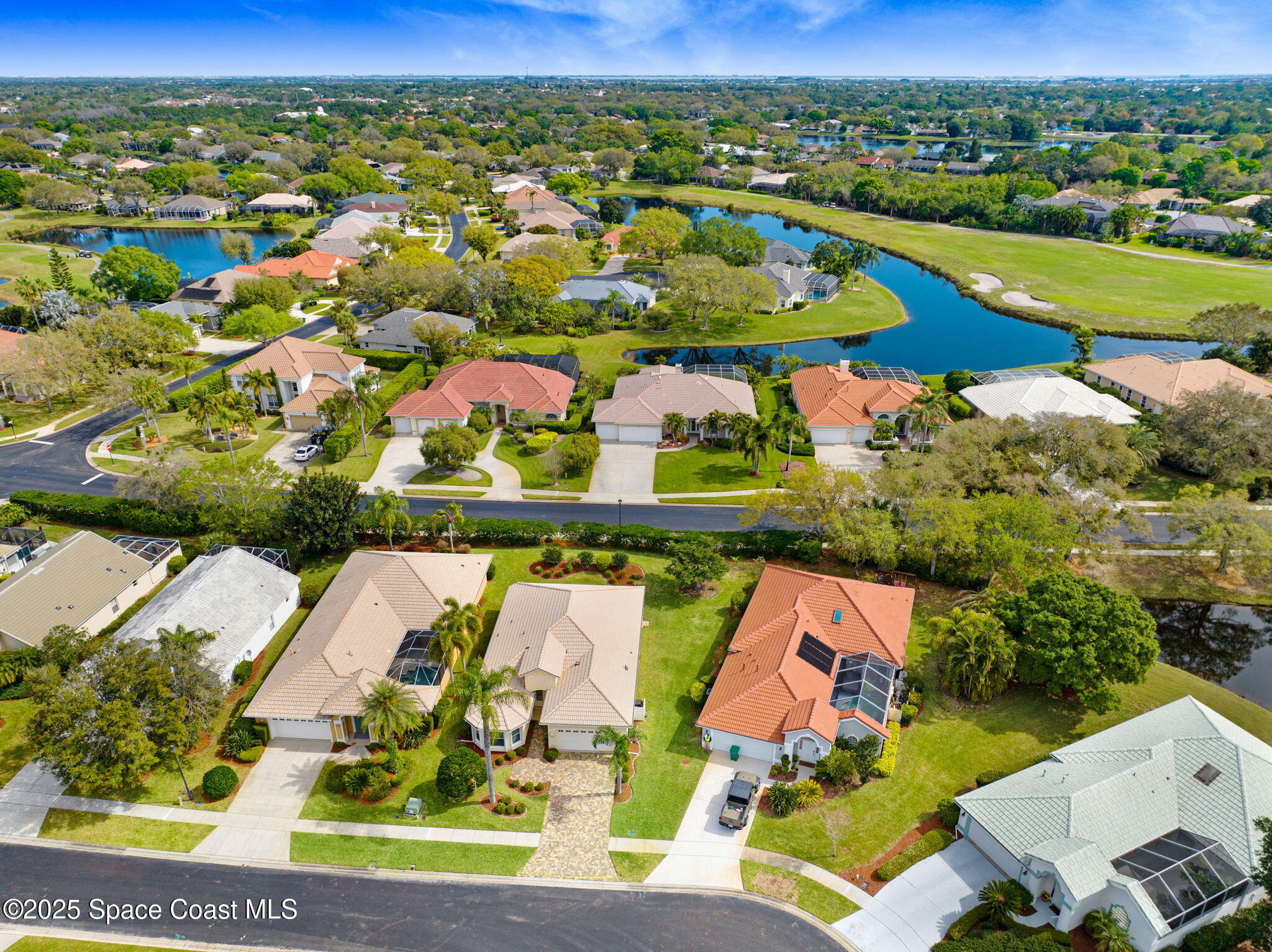 507 Royston Lane Melbourne, FL 32940 - Photo 16 of 52 an aerial view of residential houses with outdoor space and river