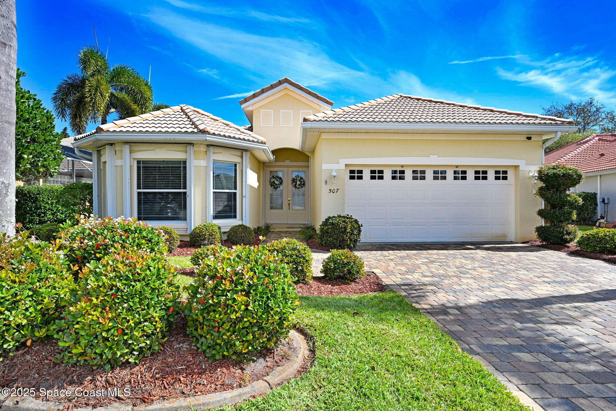 507 Royston Lane Melbourne, FL 32940 - Photo 2 of 52 front view of a house with a yard