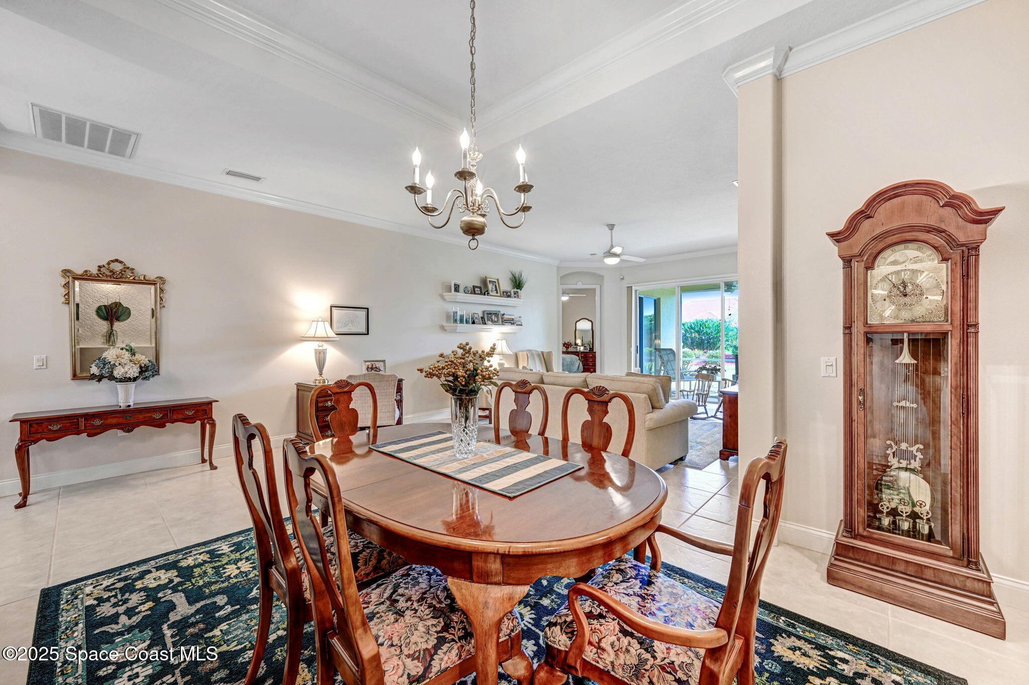 507 Royston Lane Melbourne, FL 32940 - Photo 22 of 52 a view of a a dining room with furniture window and wooden floor