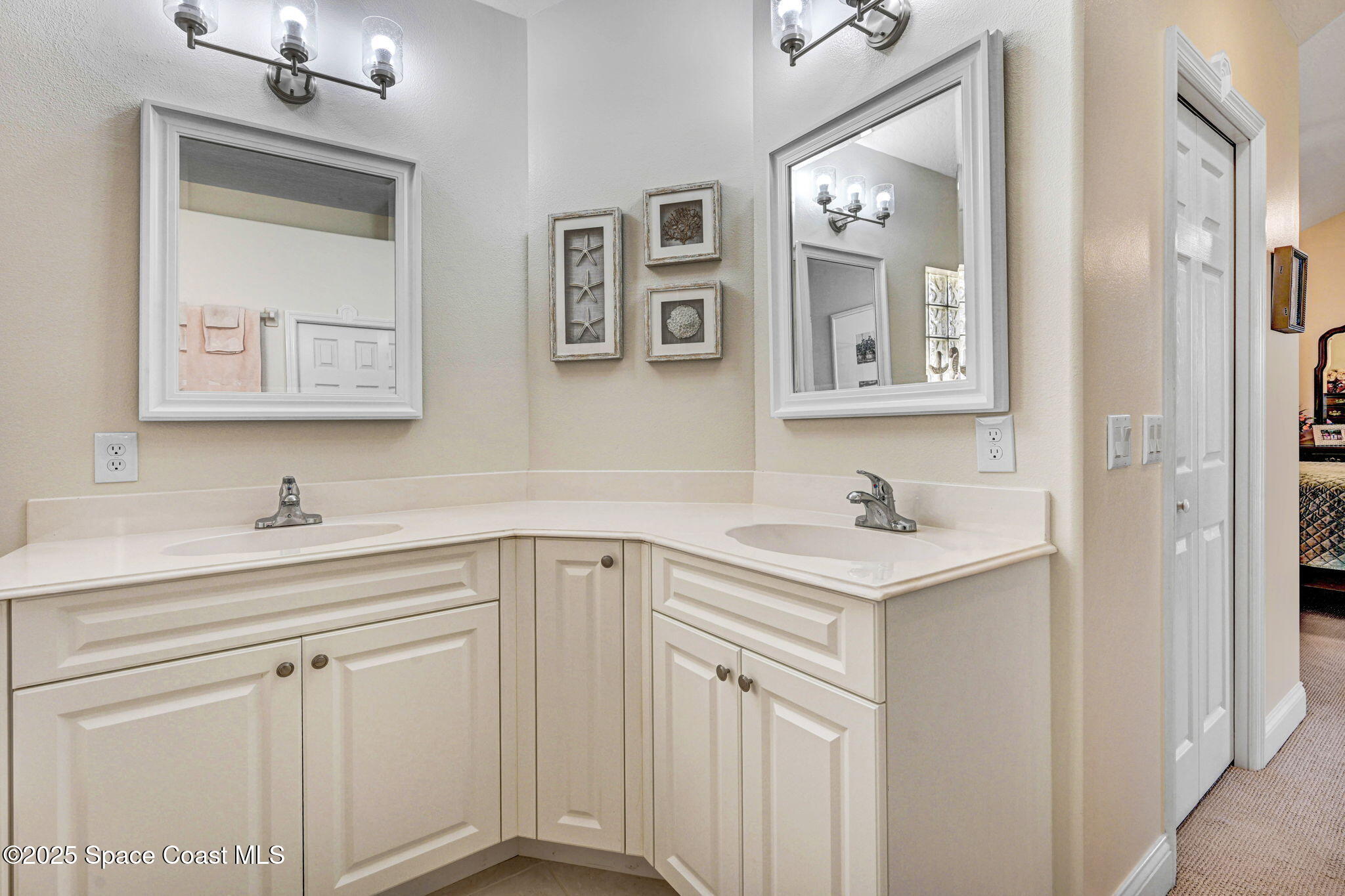 507 Royston Lane Melbourne, FL 32940 - Photo 40 of 52 a bathroom with a sink and a mirror
