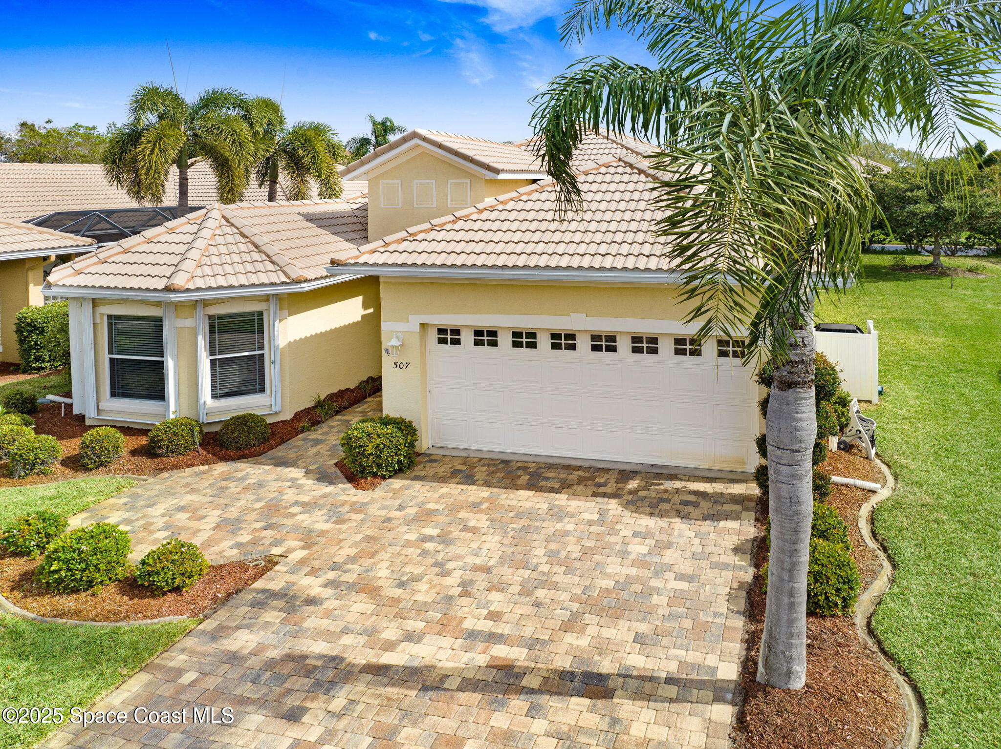 507 Royston Lane Melbourne, FL 32940 - Photo 4 of 52 a front view of a house with a yard