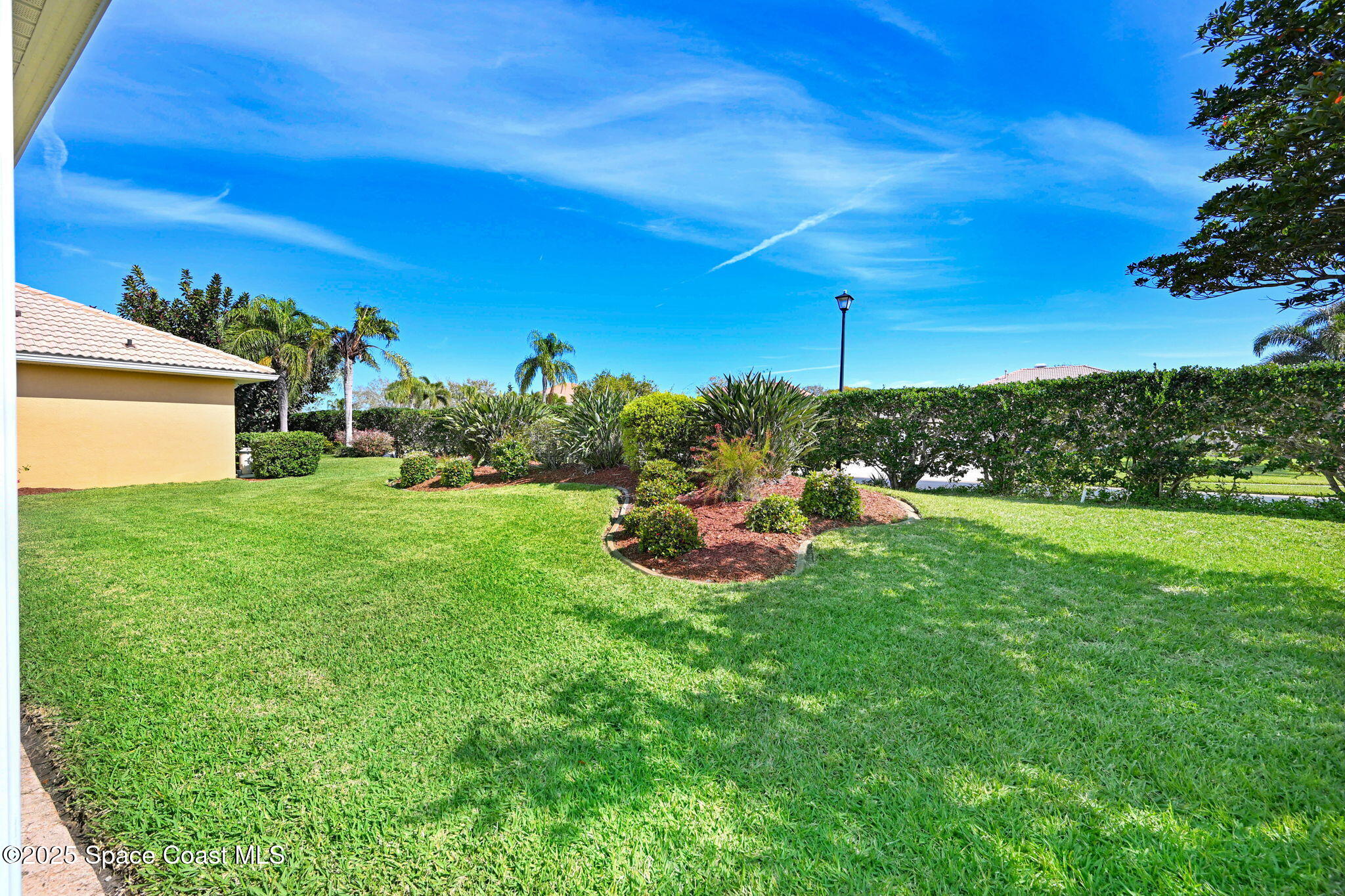 507 Royston Lane Melbourne, FL 32940 - Photo 47 of 52 a view of a backyard with sitting area