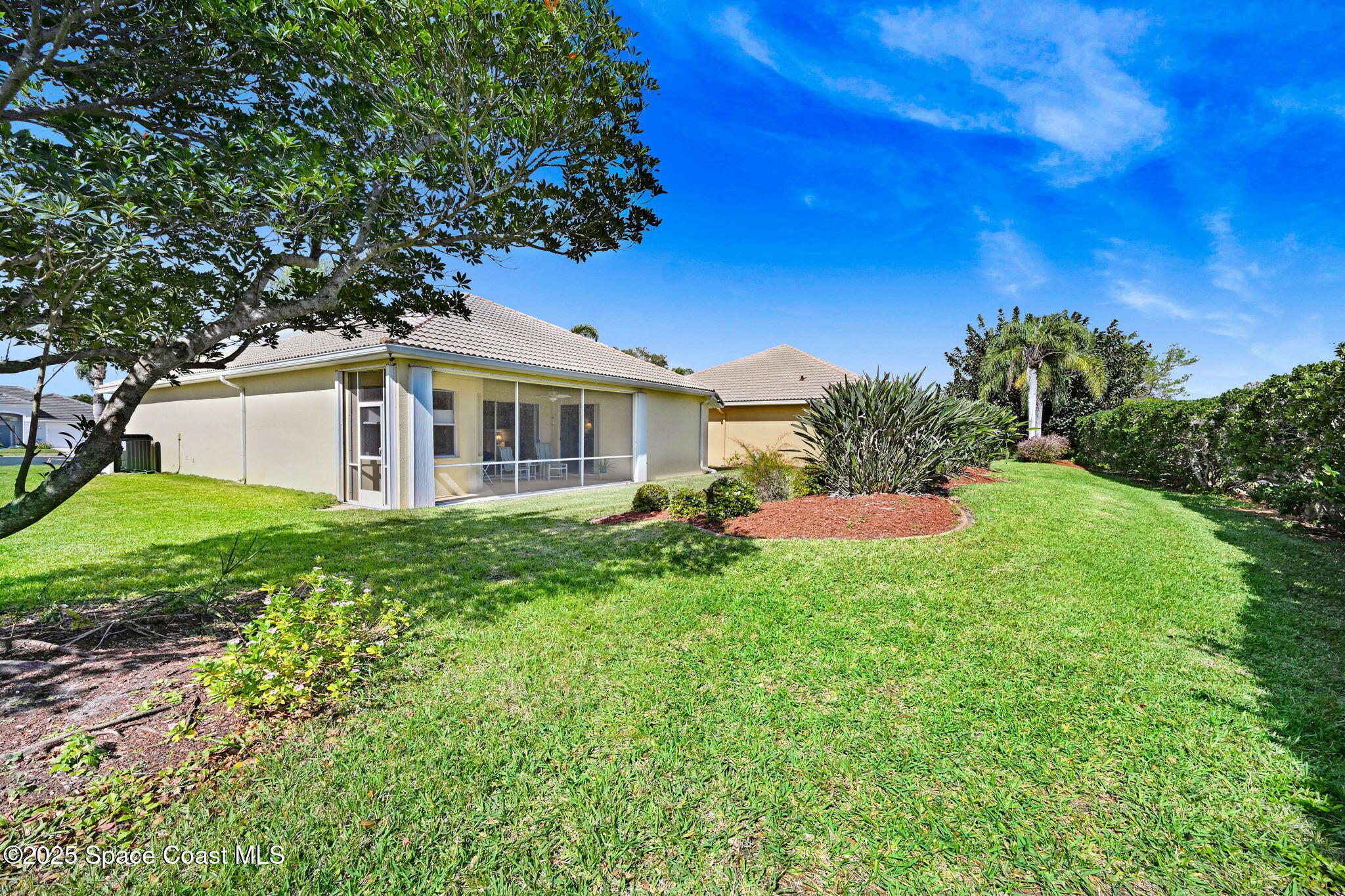 507 Royston Lane Melbourne, FL 32940 - Photo 48 of 52 a view of a house with a yard and tree s