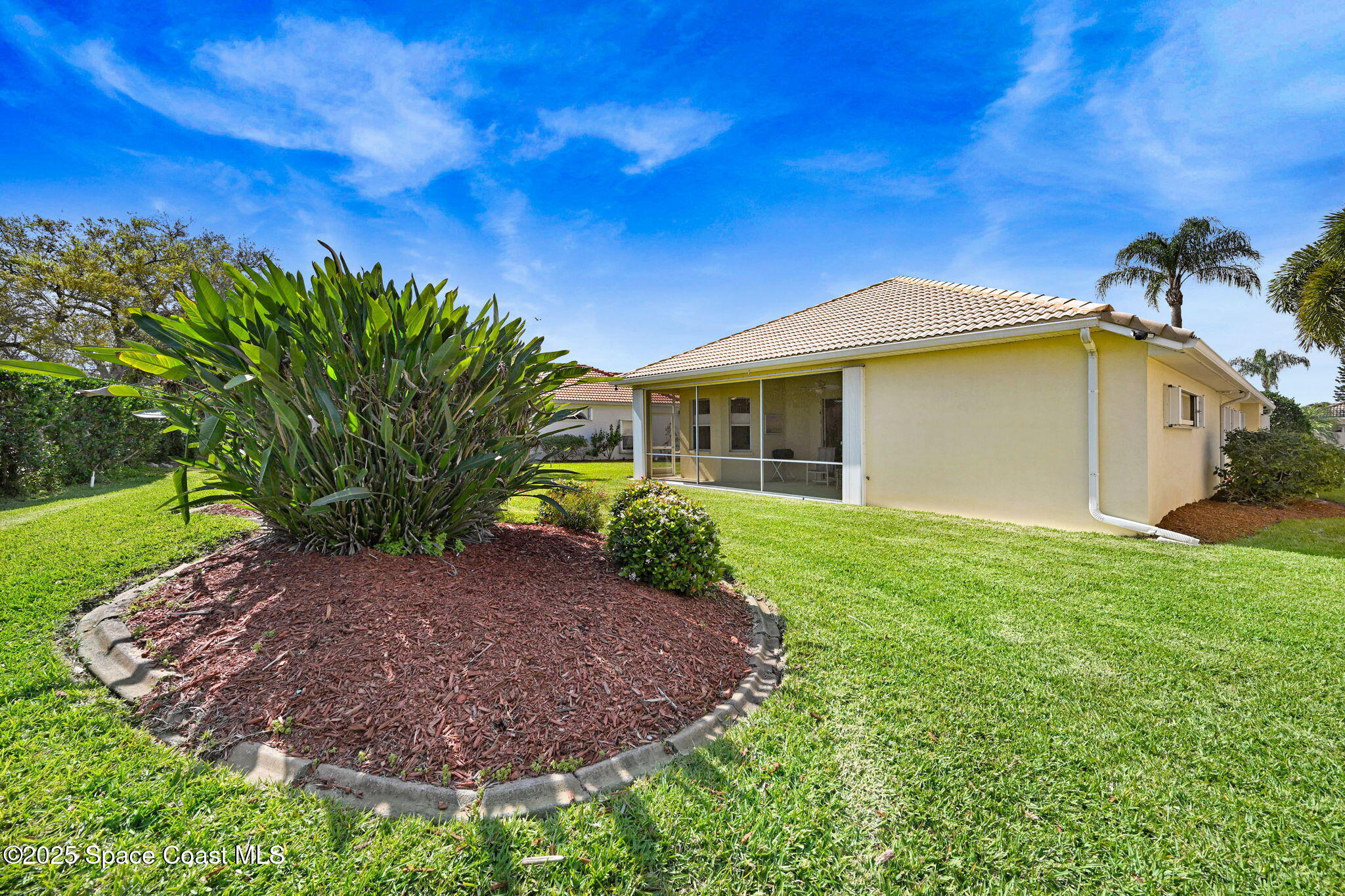 507 Royston Lane Melbourne, FL 32940 - Photo 49 of 52 a view of a house with a yard