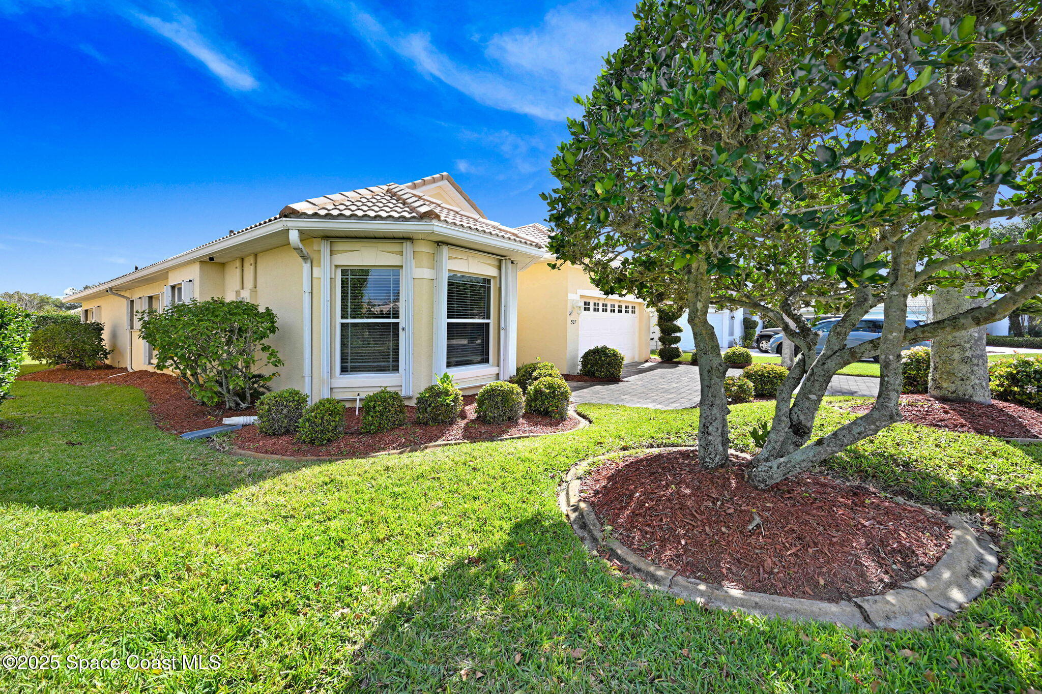 507 Royston Lane Melbourne, FL 32940 - Photo 51 of 52 a front view of a house with a yard