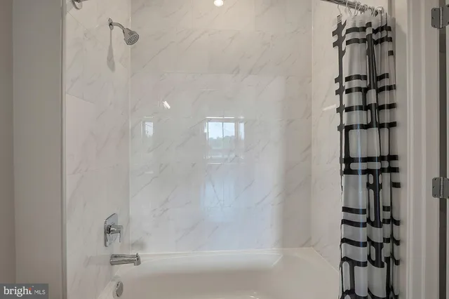 a bathroom with a bathtub