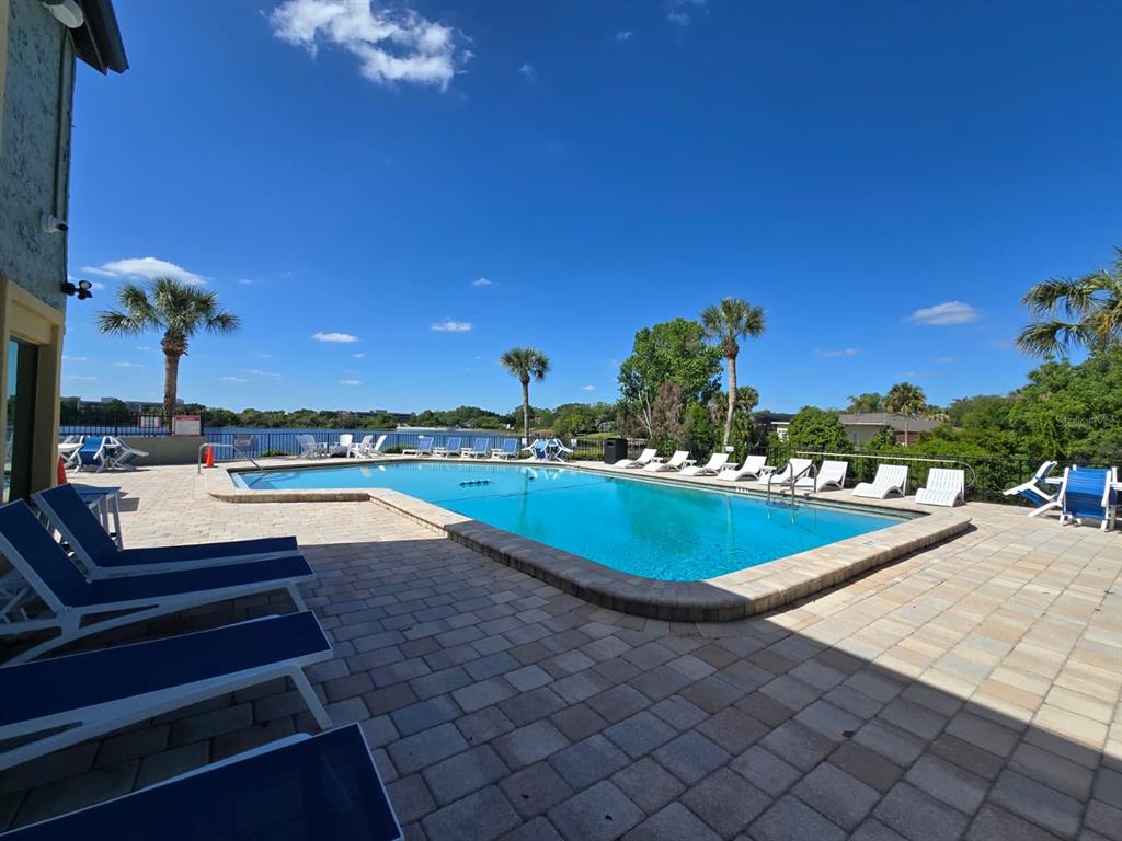 902 Lake Destiny Road, Unit C Altamonte Springs, FL 32714 - Photo 23 of 23 a view of a swimming pool with an outdoor seating