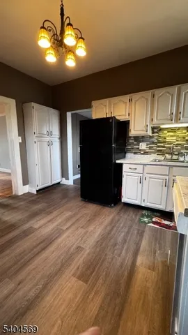 a view of deck with wooden floor and outdoor seating