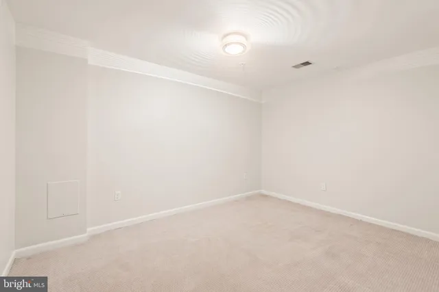 a balcony with wooden floor and fence