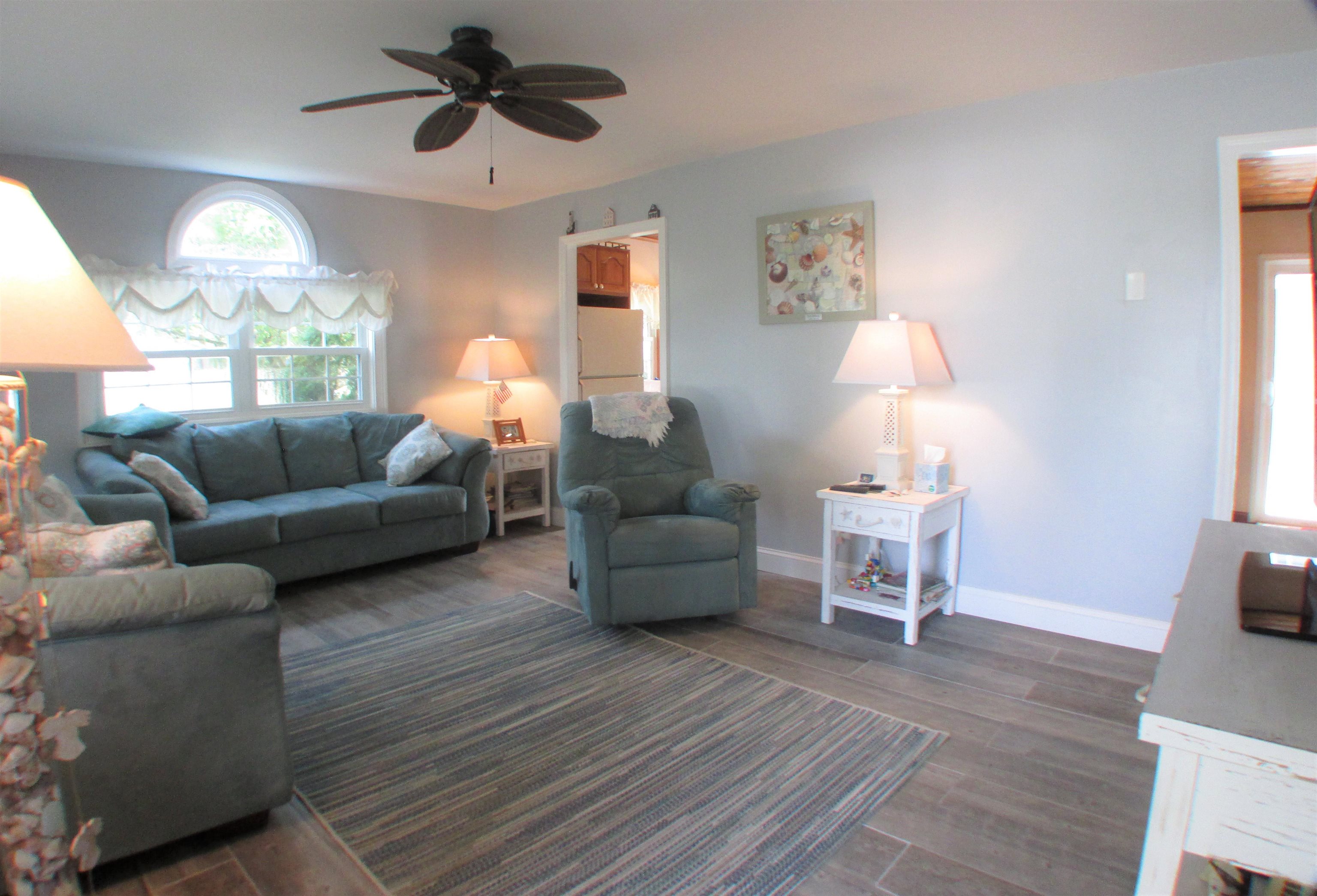 101 Kenvil Road North Cape May, NJ 08204 - Photo 2 of 27 a living room with furniture and a large window